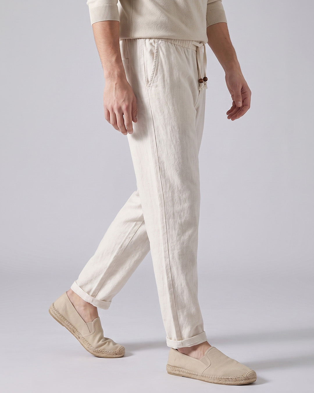 Men's Casual Linen Drawstring Pants in Beige by Hudson & Tate - in motion view