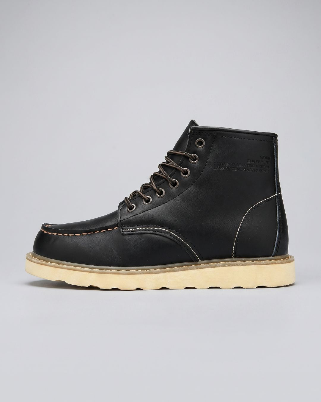 A single black leather lace-up ankle boot with contrast stitching, a cream-colored sole, and a tan jute-wrapped edge, shown in profile against a light gray background.