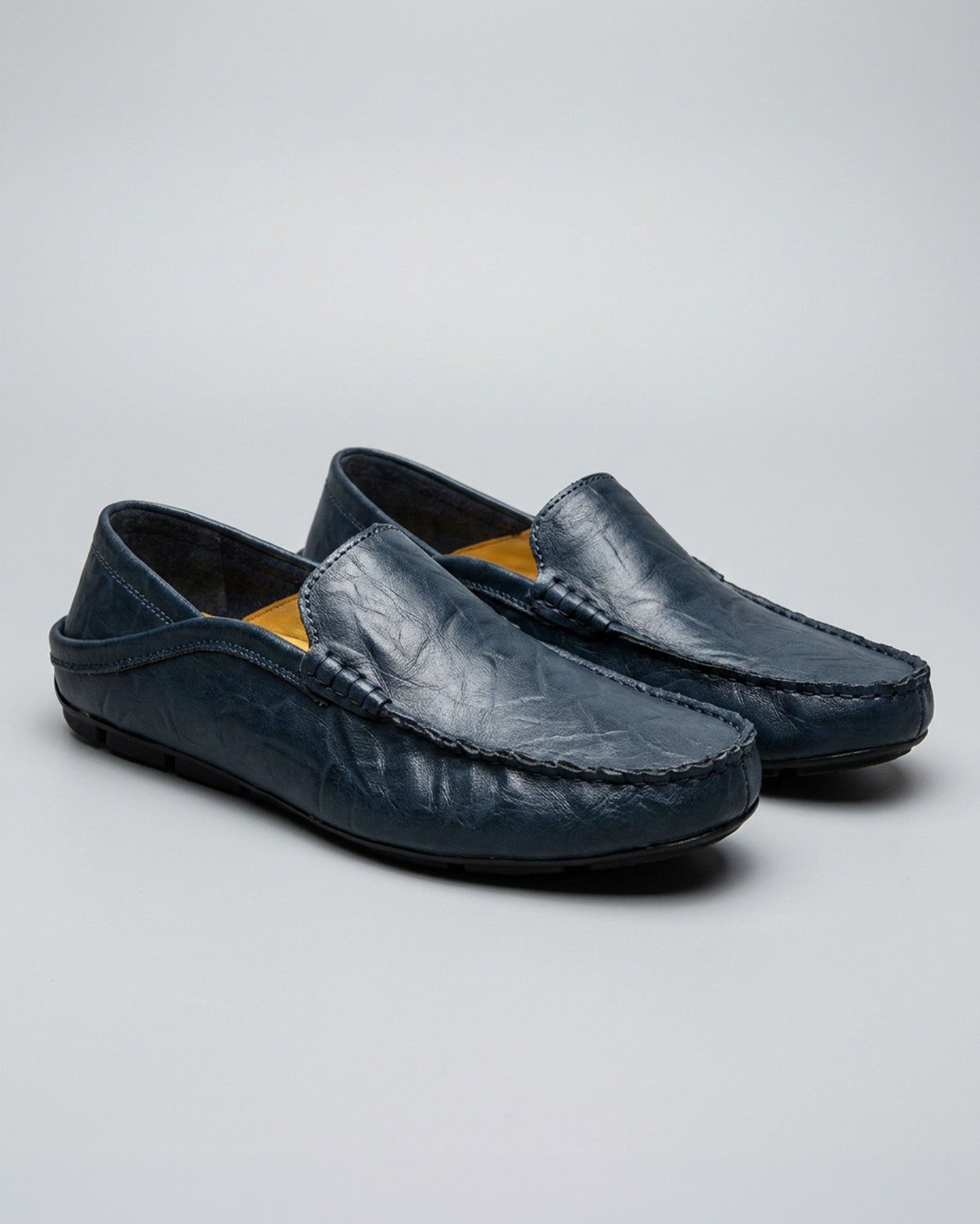 Pair of Beckett men's navy leather driving loafers
