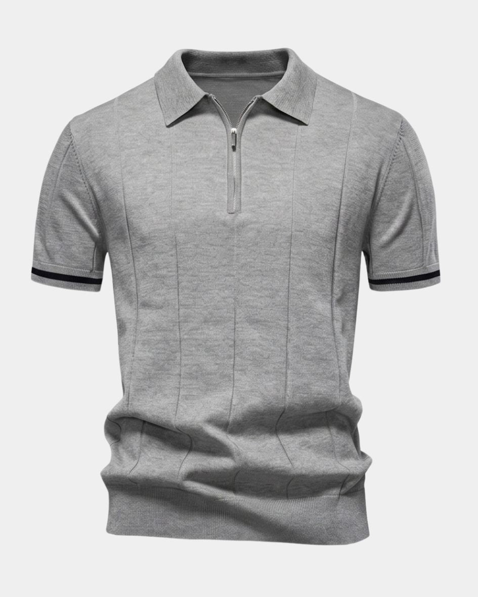 Light gray polo shirt with black trim on a white background
