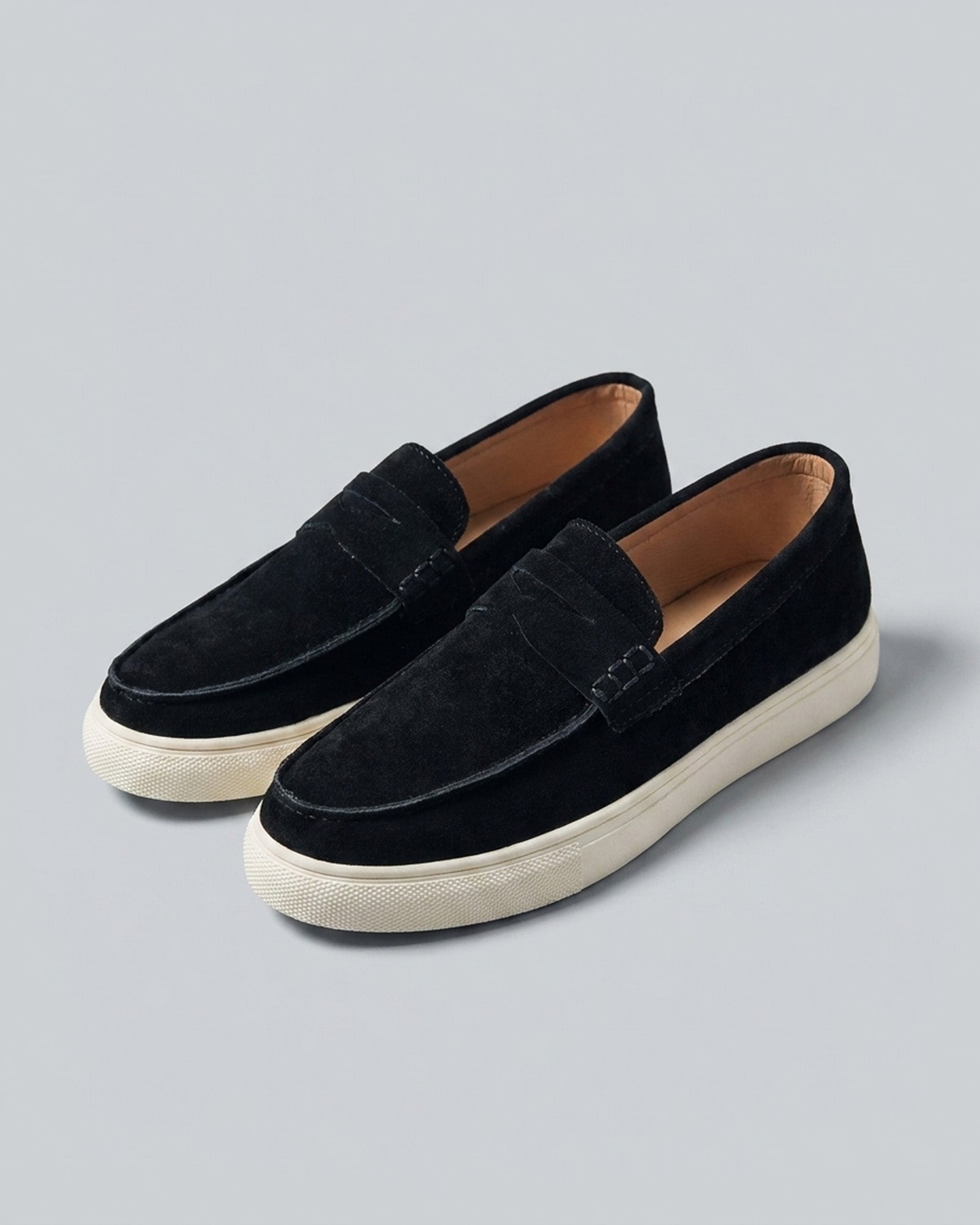 Pair of Dunley men's black penny loafers with off-white cupsole