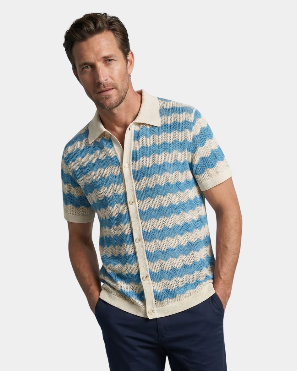 Man wearing a blue and beige striped shirt with a white background