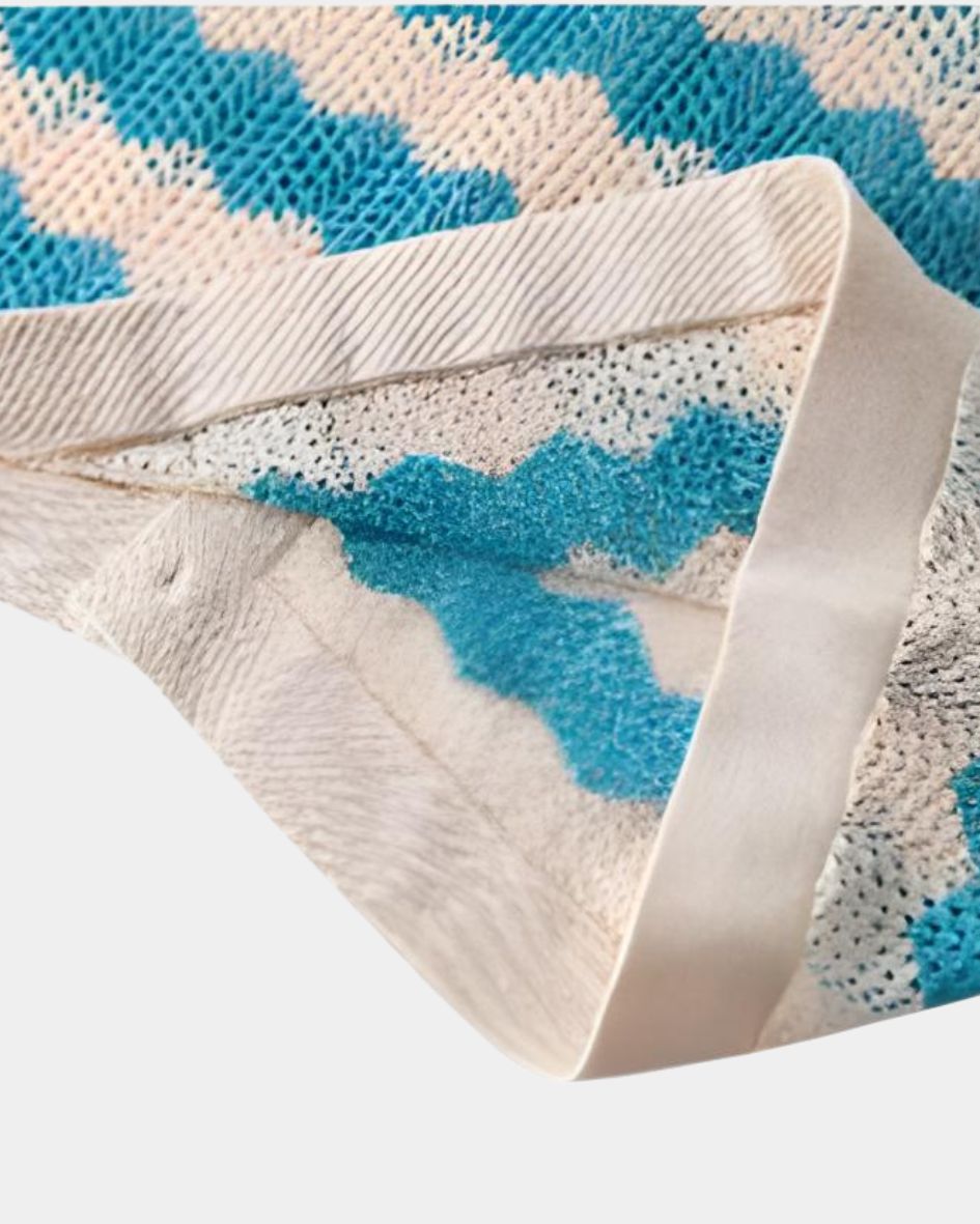 Close-up of a textured fabric with blue and white pattern