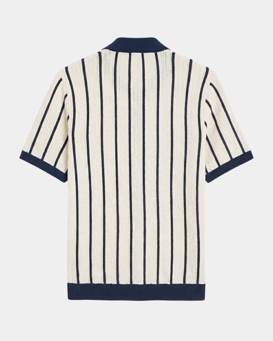 Striped shirt with navy accents on a white background