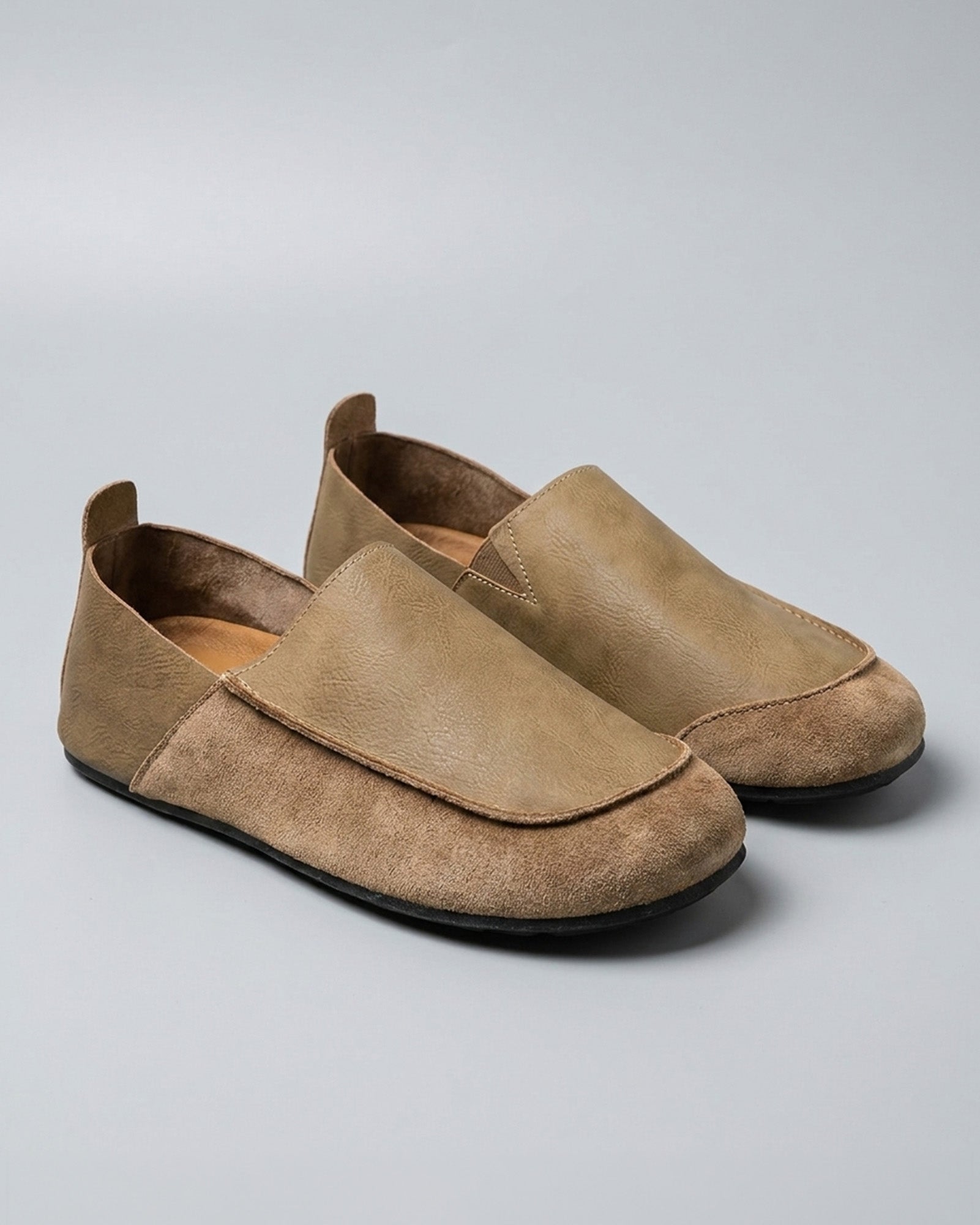 Pair of Luca men's beige relaxed slip-on loafers with contrast vamp panel