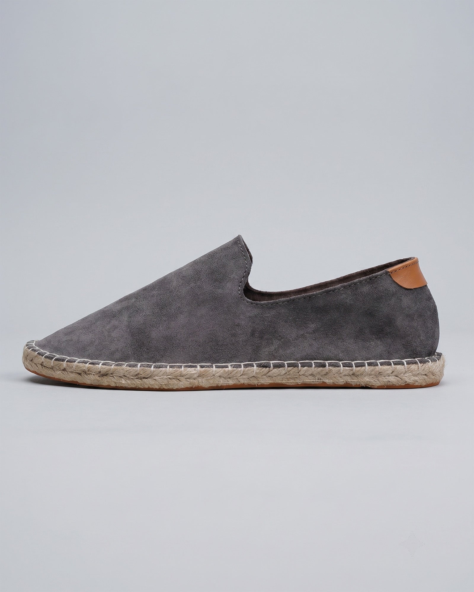 Side view of Malaga men's gray suede espadrille loafers with tan heel counter and jute rope sole