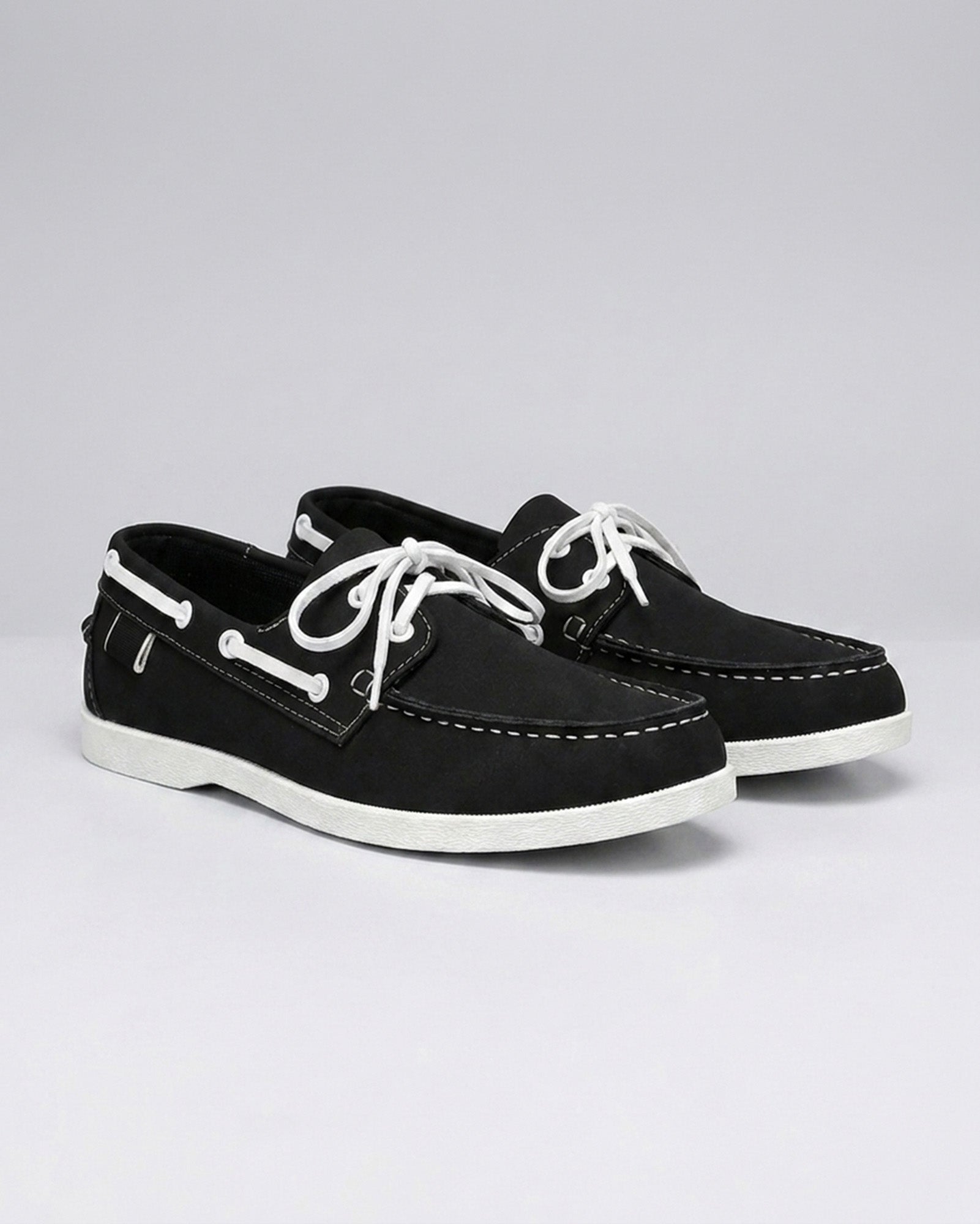 Nightdock men's black boat shoes - paired studio shot with contrast stitching