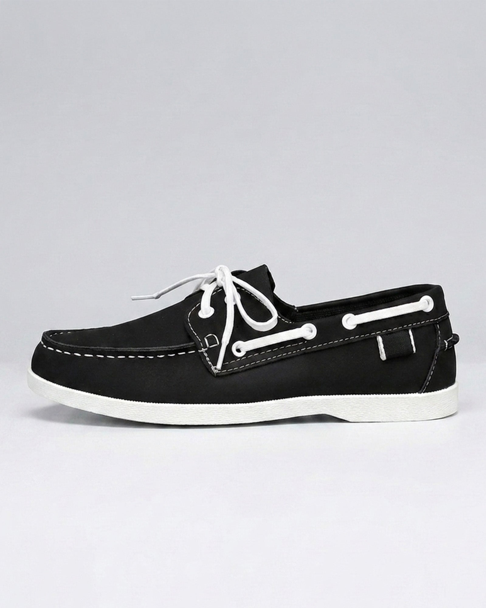 Nightdock men's black boat shoes - side view with white contrast stitching