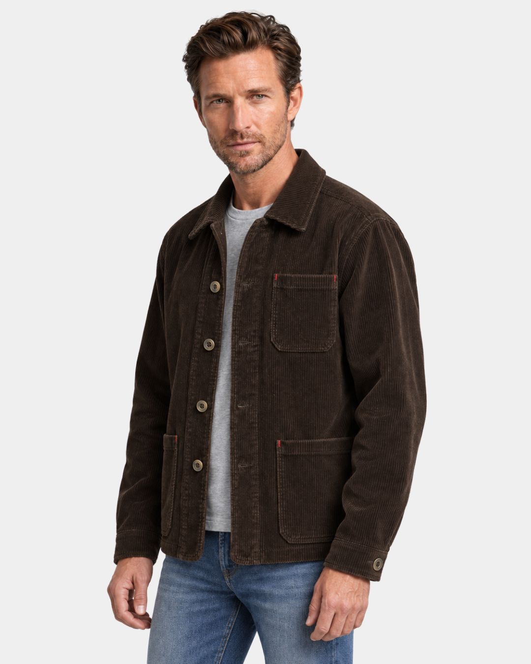 Men's brown corduroy chore jacket with a point collar, button front, and red bar-tack pocket details.