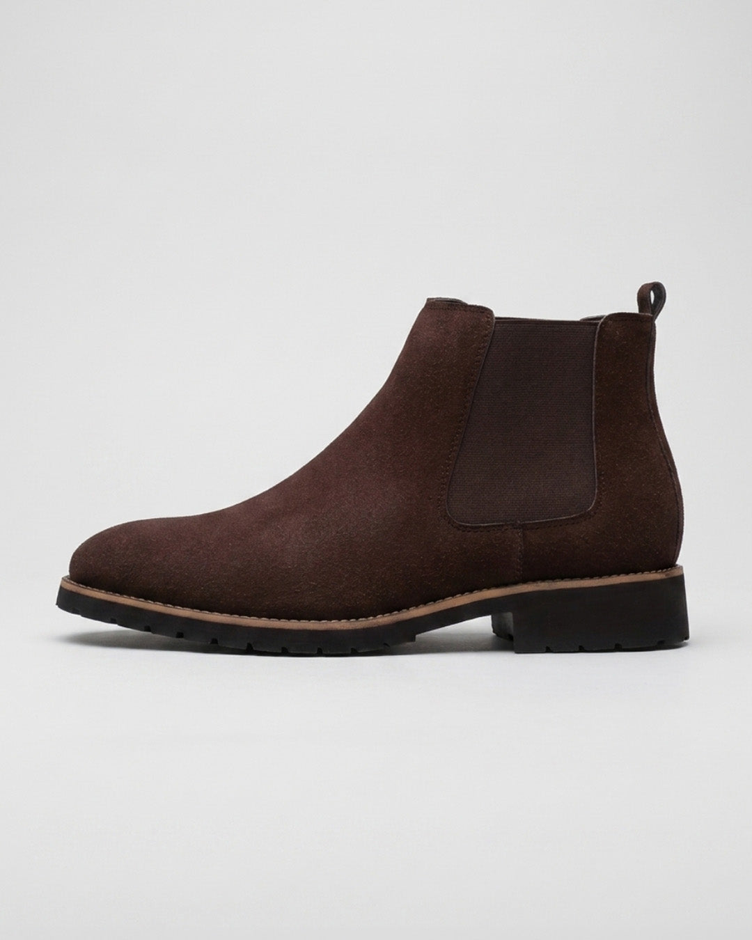 Dark brown suede Chelsea boots with elastic side panels, a rounded toe, and a durable rubber lug sole.