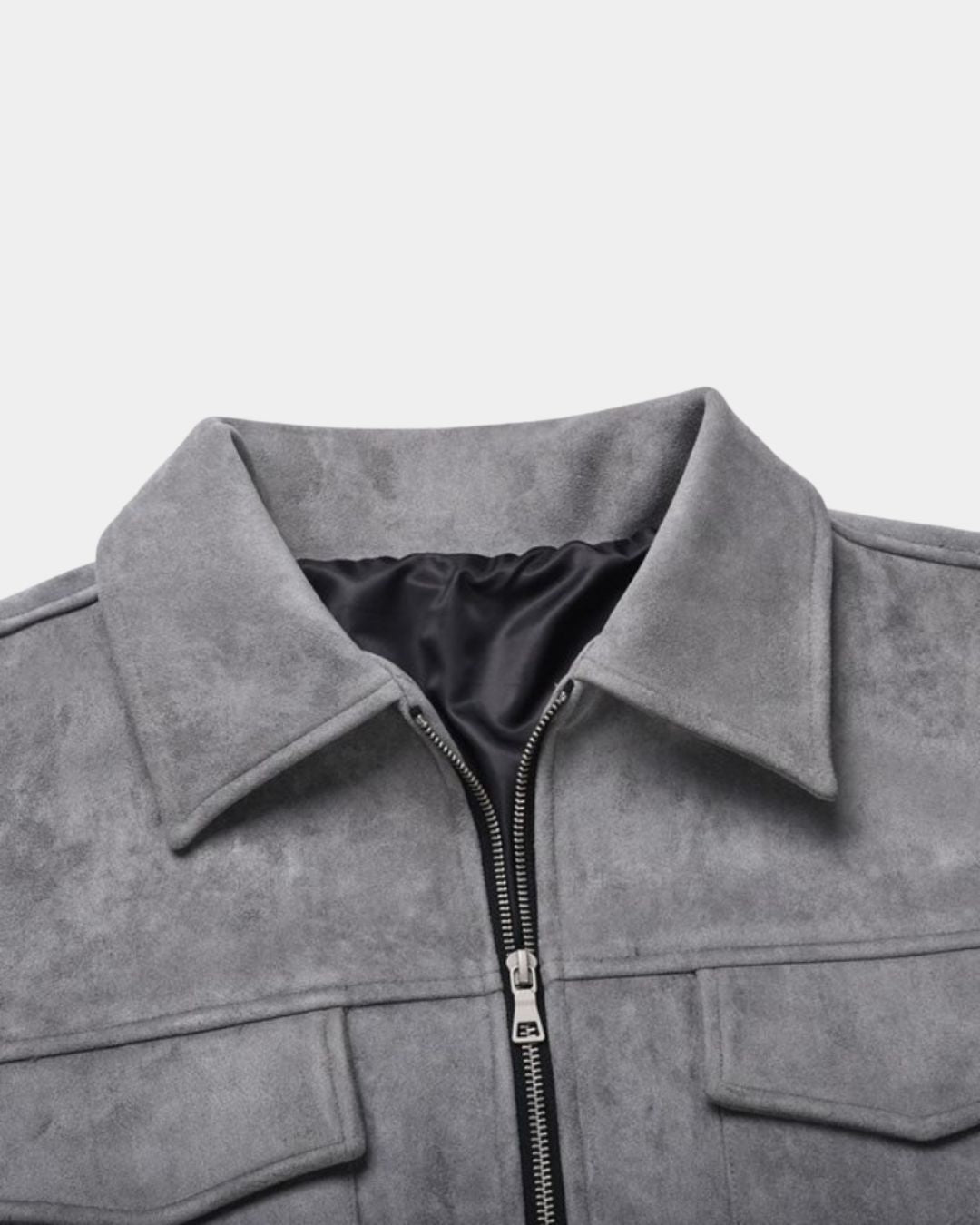 Close-up of a men's gray casual zip-up overshirt jacket with a pointed collar, silver zipper, and black interior lining