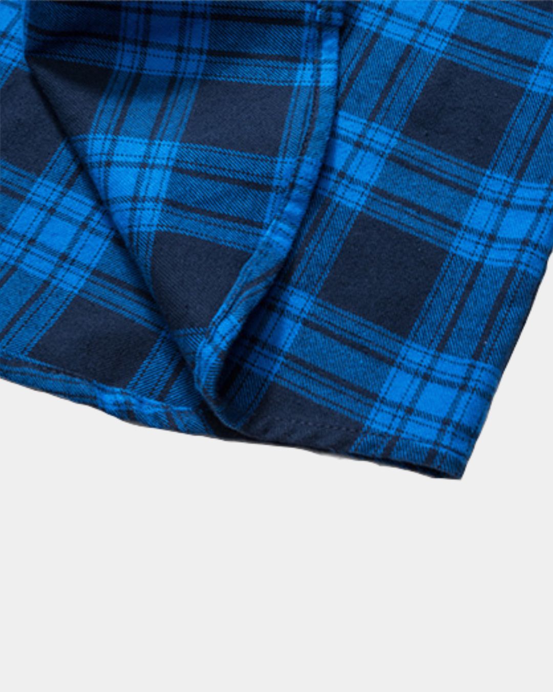 Soft blue and navy plaid flannel shirt fabric with a brushed finish and rounded hem detail.