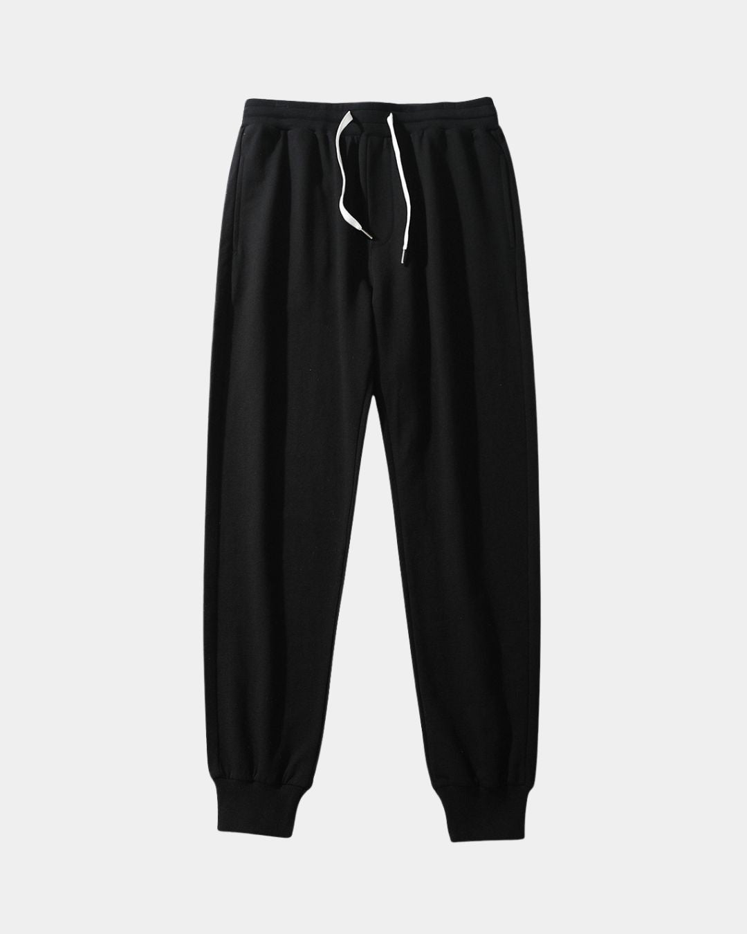 Black men's cotton jogger sweatpants with a drawstring waist and ribbed tapered ankle cuffs.