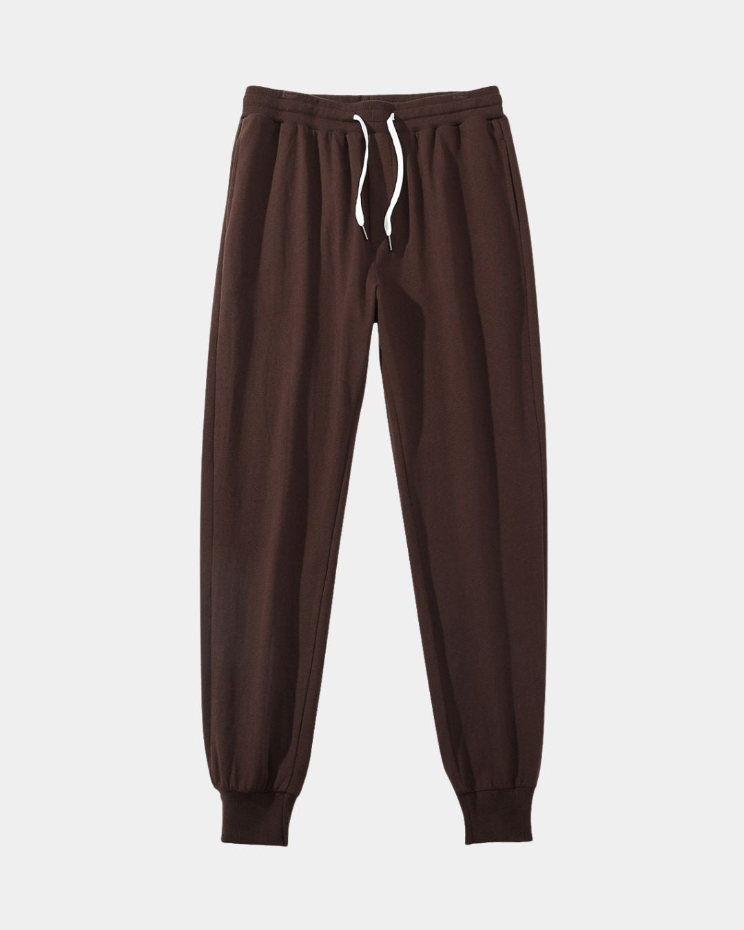Dark brown men’s cotton jogger sweatpants with a drawstring waist and tapered ribbed ankle cuffs.