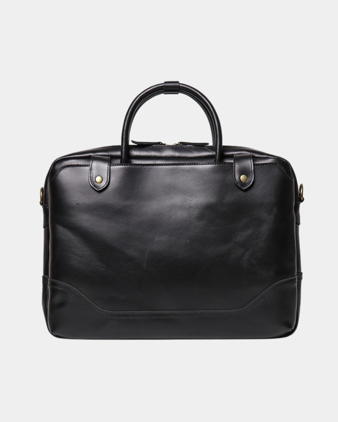 A black leather briefcase with a top handle, gold-tone hardware, and a structured rectangular shape, shown against a light gray background.