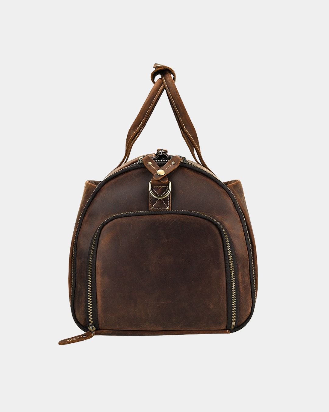 Brown Crazy Horse leather travel duffel bag with reinforced handles and a side zippered shoe compartment.