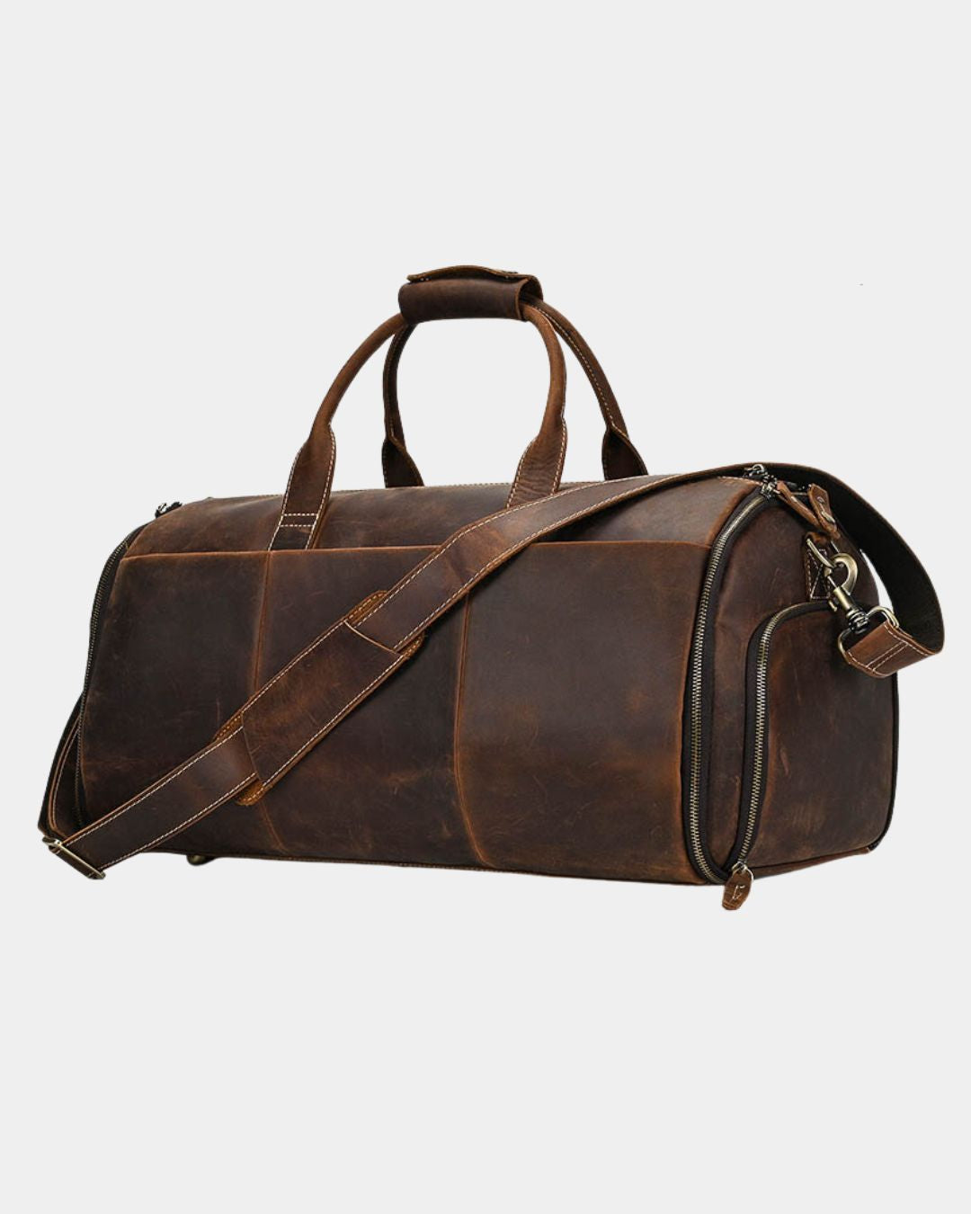 Brown Crazy Horse leather travel duffel bag with top handles, side shoe compartment, and adjustable shoulder strap.