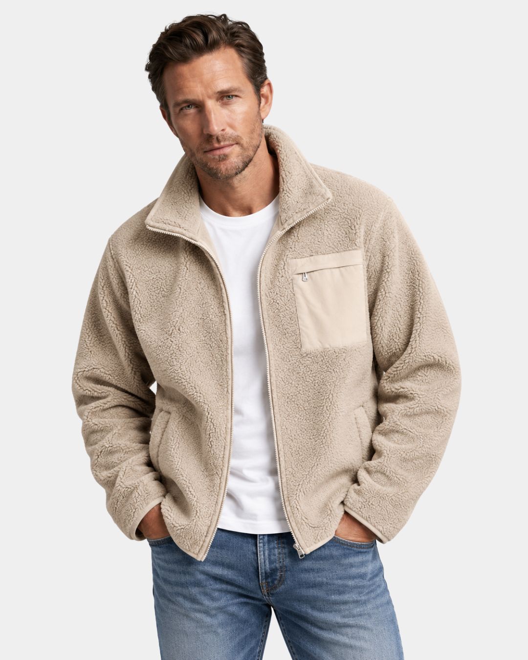 Beige men’s full-zip sherpa fleece teddy jacket with a high collar, chest pocket, and relaxed fit.