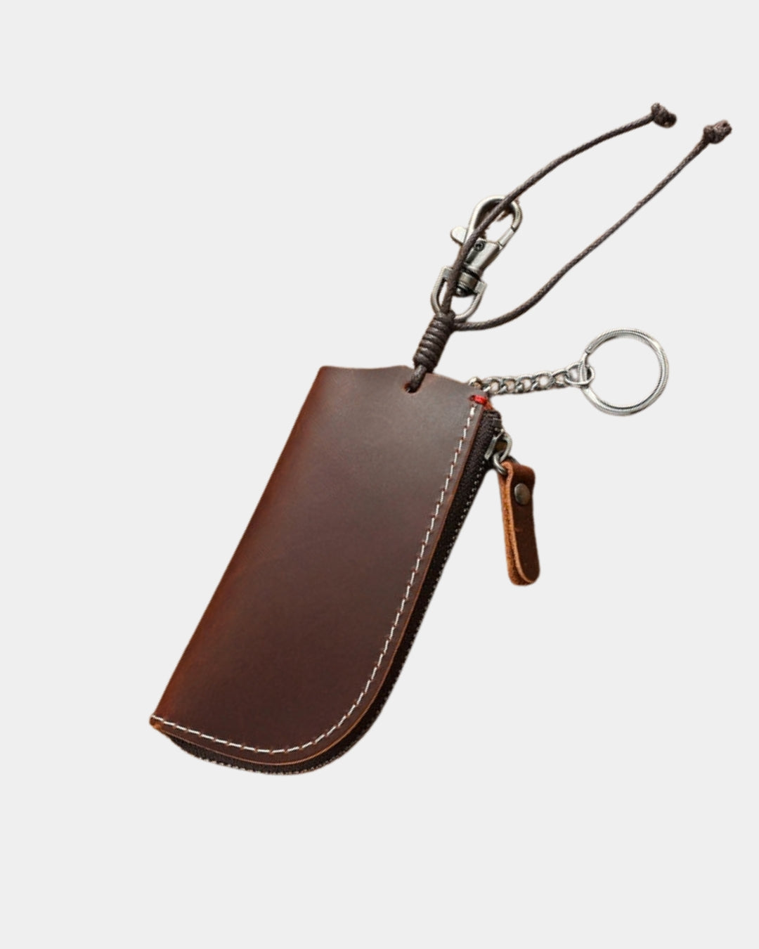 Compact brown genuine cowhide leather key wallet with a zippered closure, metal key ring, and sturdy belt clip.