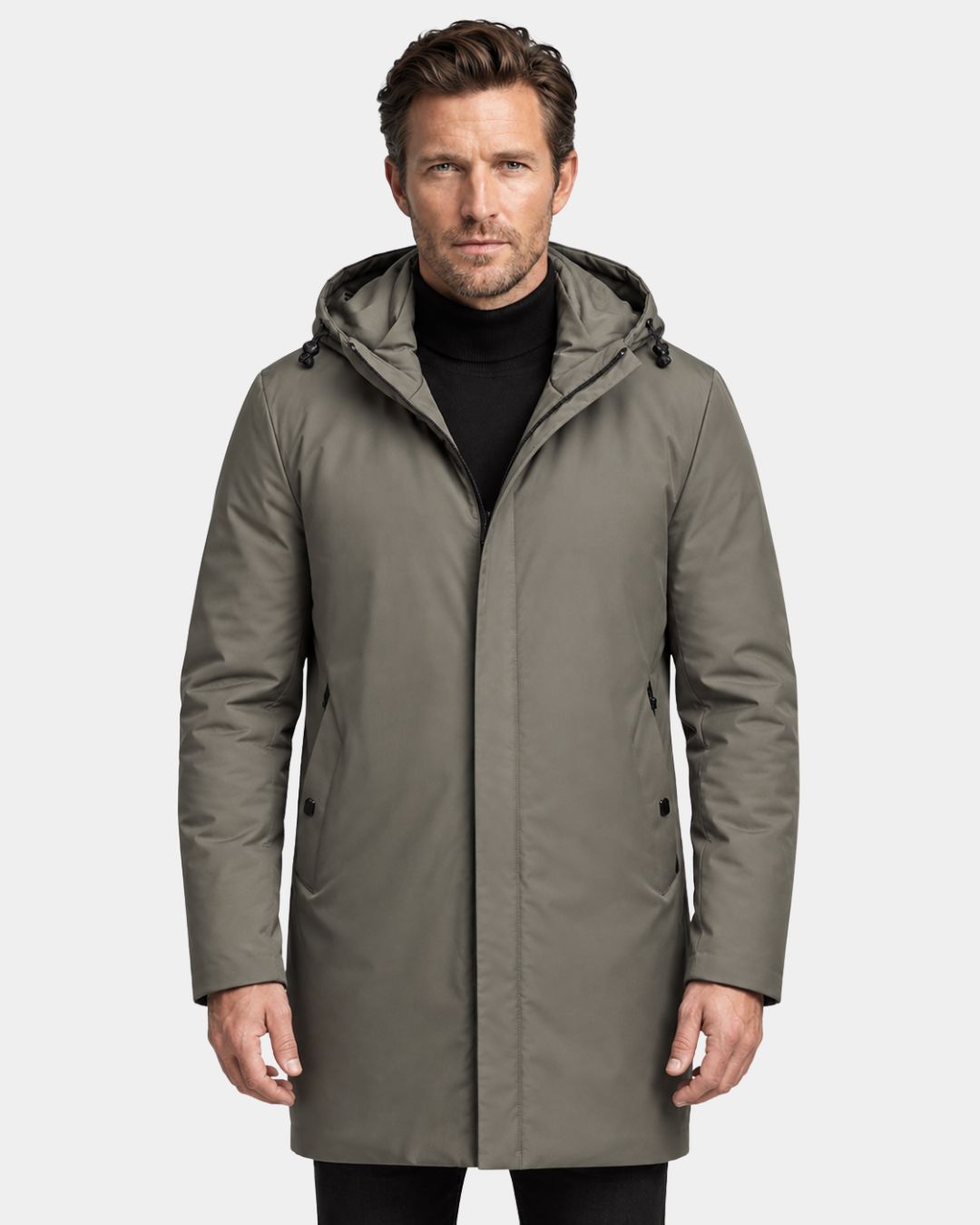 Man wearing a mid-length, olive green padded winter parka with a hood, full-zip front, and side pockets.