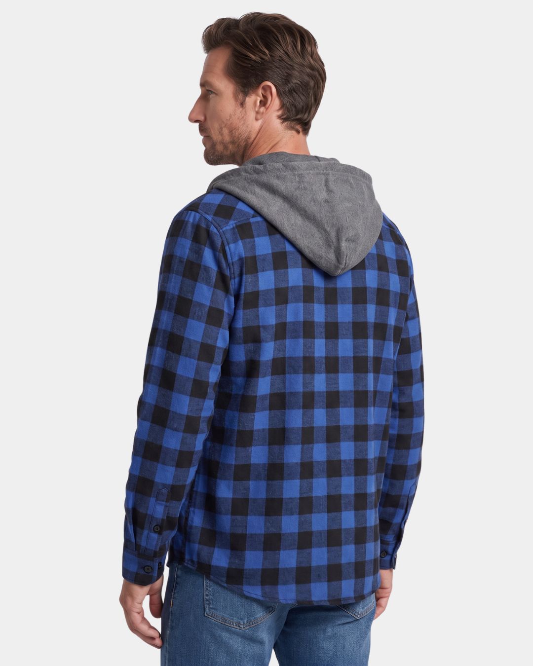 Man wearing a blue and black plaid flannel shirt with a grey attached drawstring hood, seen from the back.