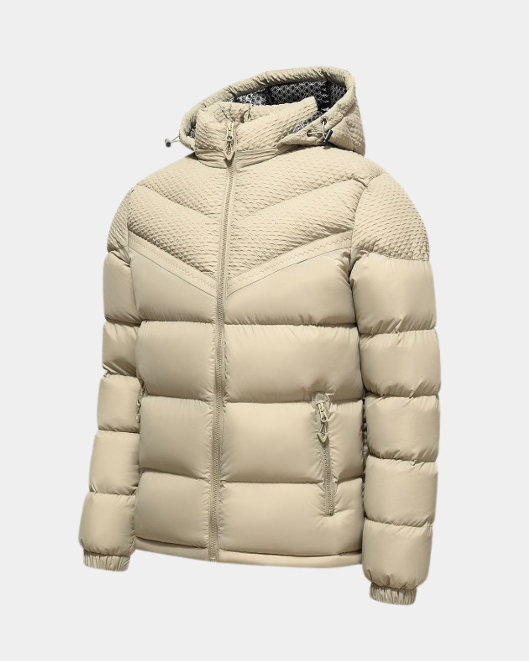 Beige hooded winter puffer jacket with textured upper panels, full-zip front, and zippered side pockets.