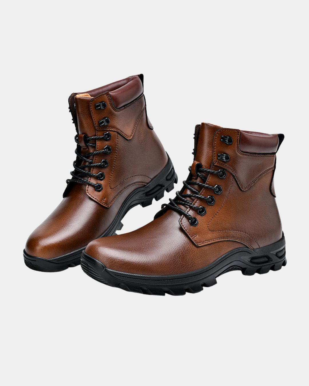 Brown cowhide leather combat boots with black laces, padded collars, and chunky lug rubber outsoles.