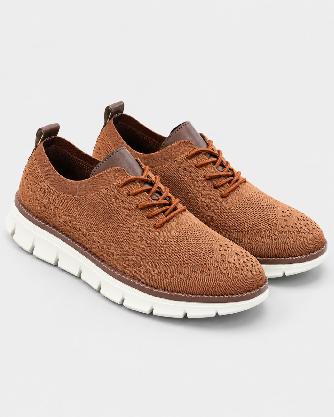 Tan breathable mesh dress sneakers with brown leather accents and a white cushioned EVA sole.