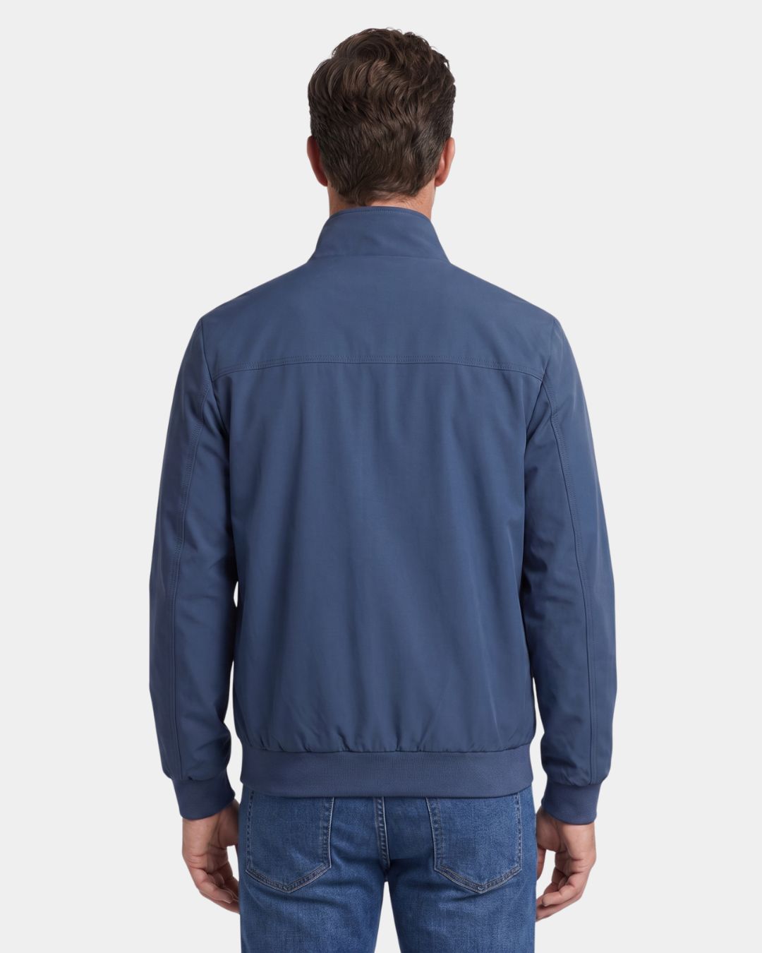 Back view of a blue men's lightweight Harrington jacket with a stand collar, ribbed hem, and streamlined regular fit.