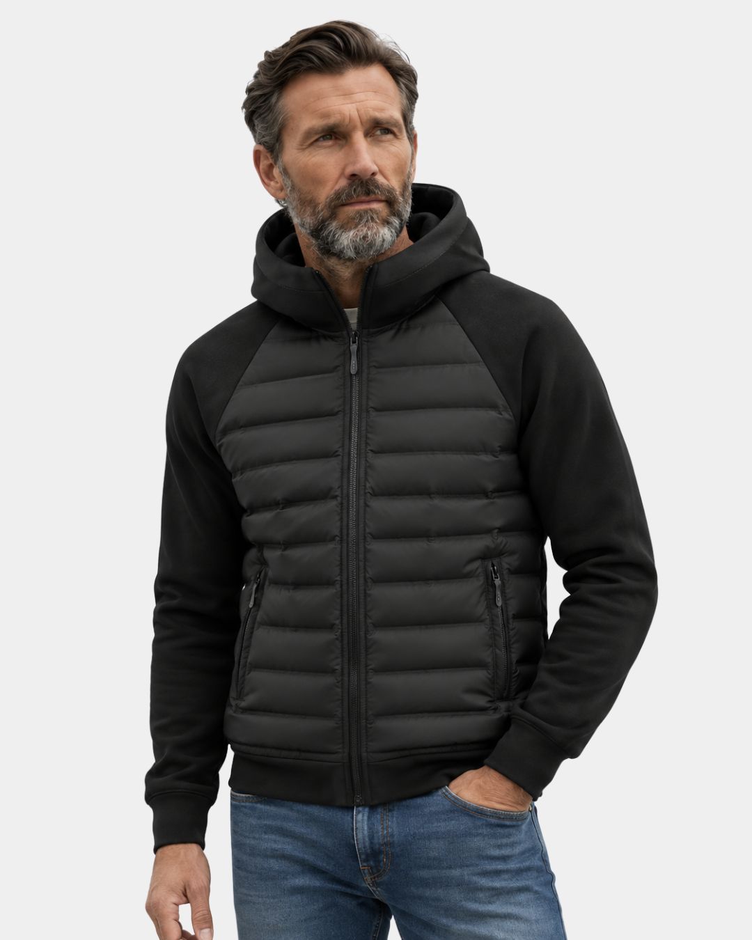 Men's black hybrid puffer jacket with quilted down body, soft knit sleeves, hood, and zip pockets.