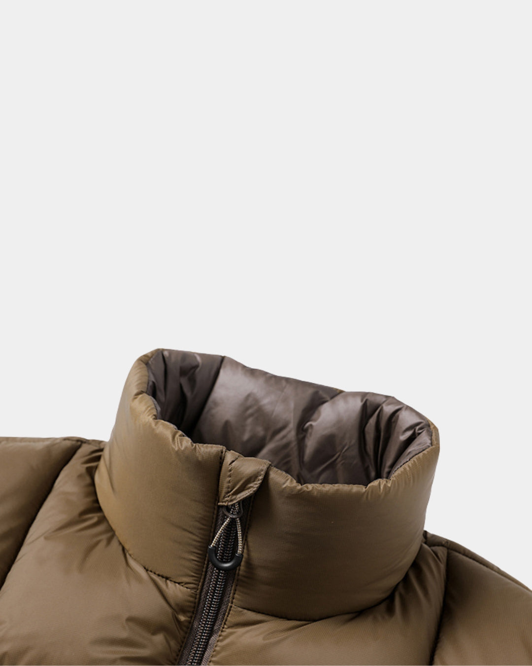 Brown padded winter puffer jacket with a stand collar and full front zipper closure.