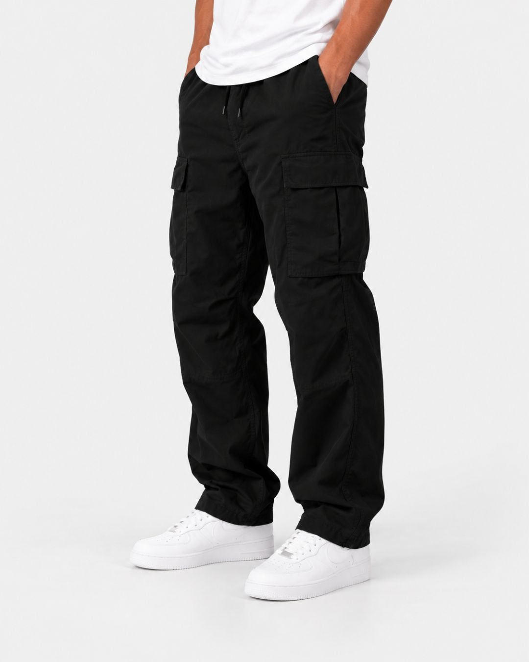 Men’s black relaxed-fit cargo pants with side flap pockets, an elastic drawstring waist, and adjustable hem cords.