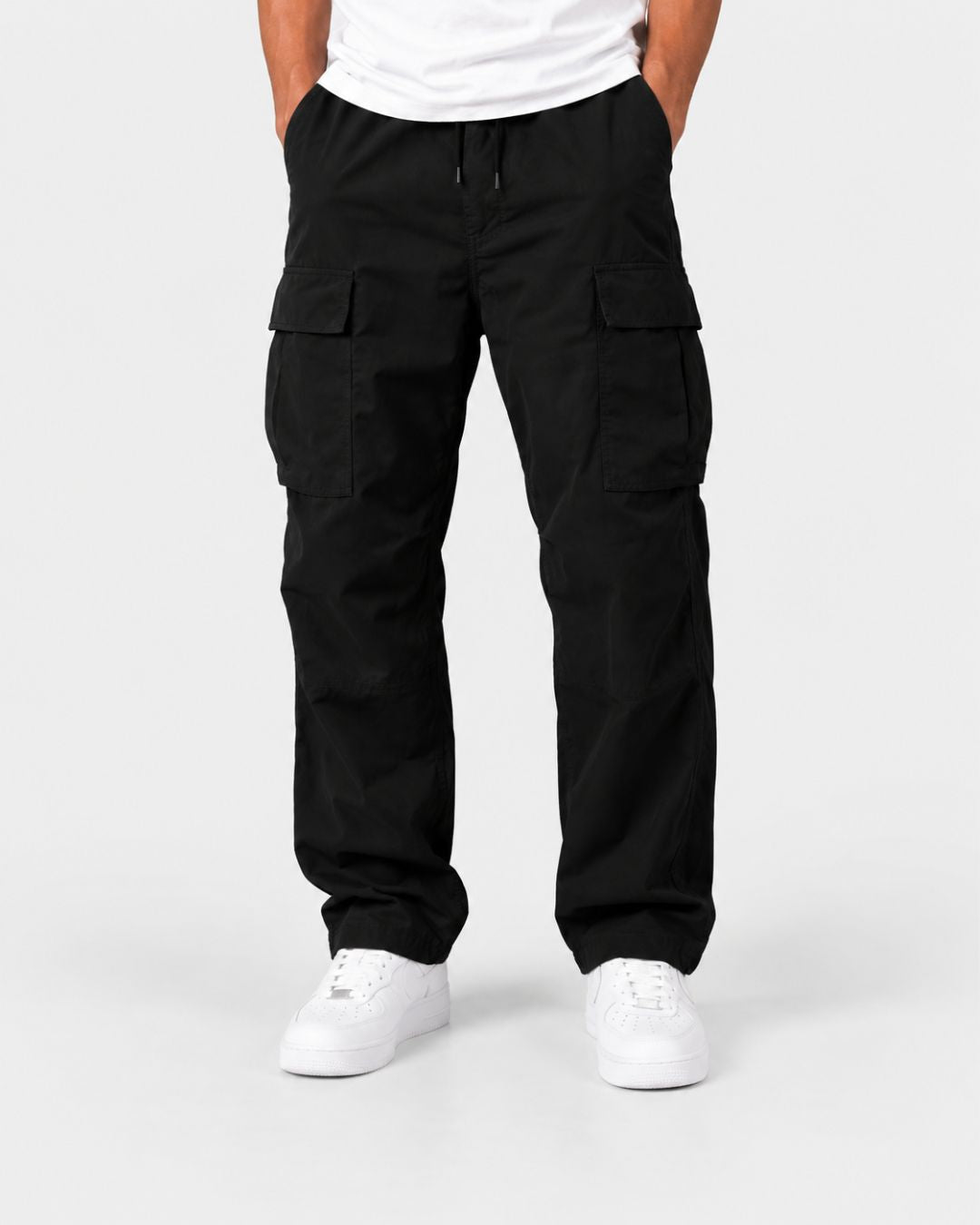 Men's black relaxed-fit cargo pants with an elastic drawstring waist and large side flap pockets.