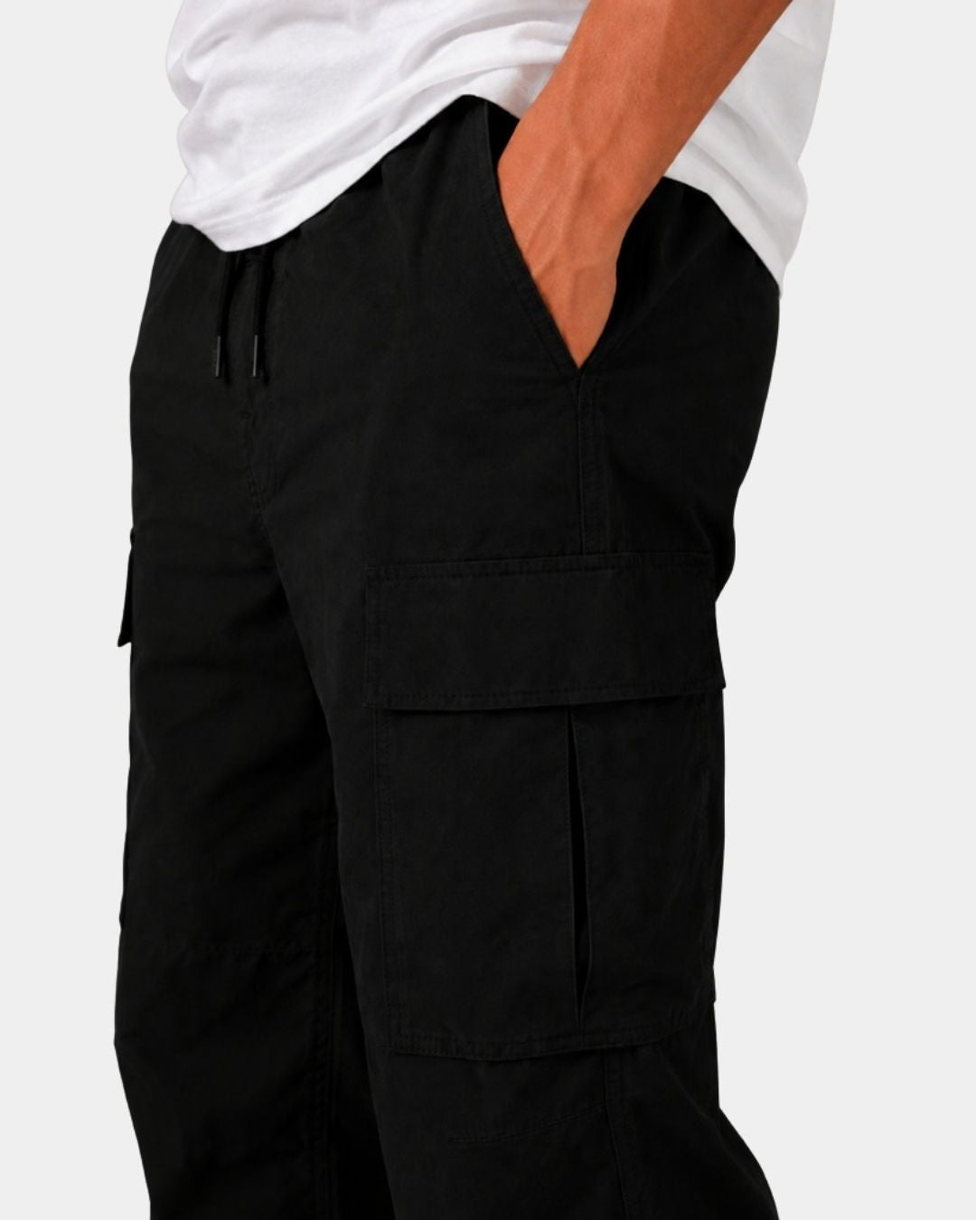 Men’s black relaxed-fit cargo pants with a drawstring waistband and large side flap pockets.