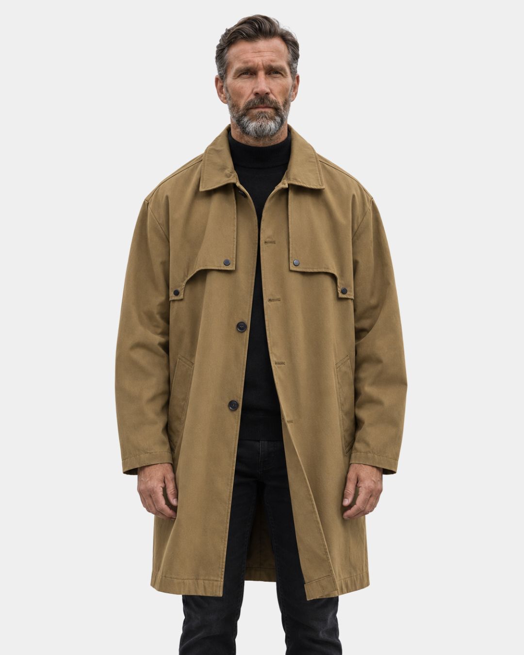 Man wearing a tan relaxed-fit trench coat with a lapel collar, single-breasted button front, and side pockets.