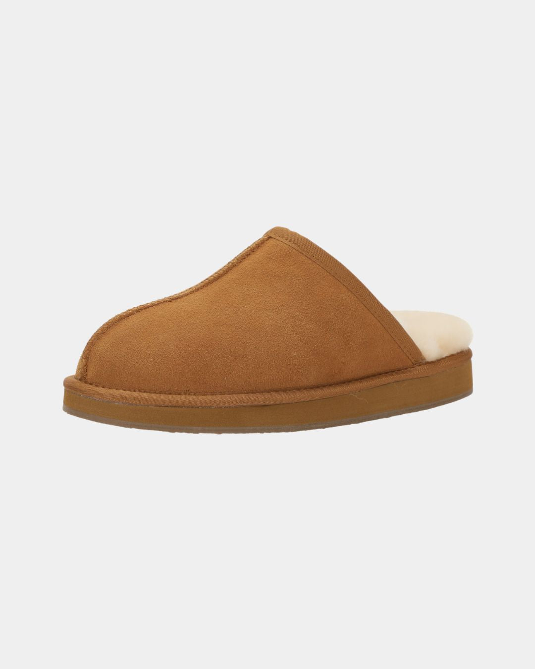 Tan sheepskin mule slippers for men with a soft cream wool lining and a durable low-profile rubber sole.