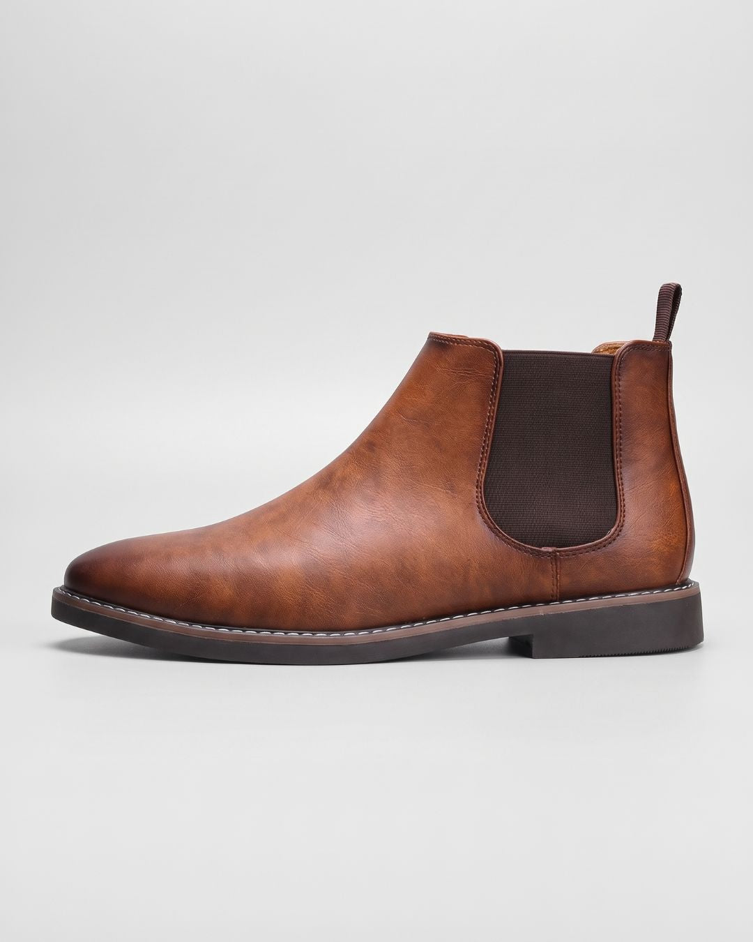 Mens brown slip on chelsea boots london style in side view
