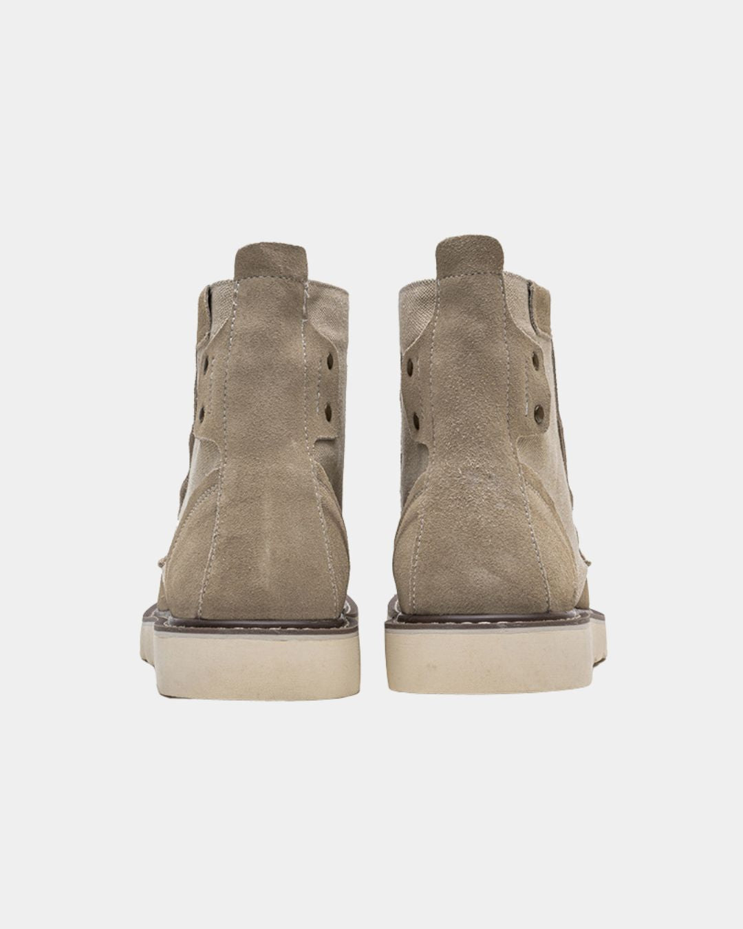 Back view of tan suede and canvas men's ankle boots with a chunky rubber outsole.