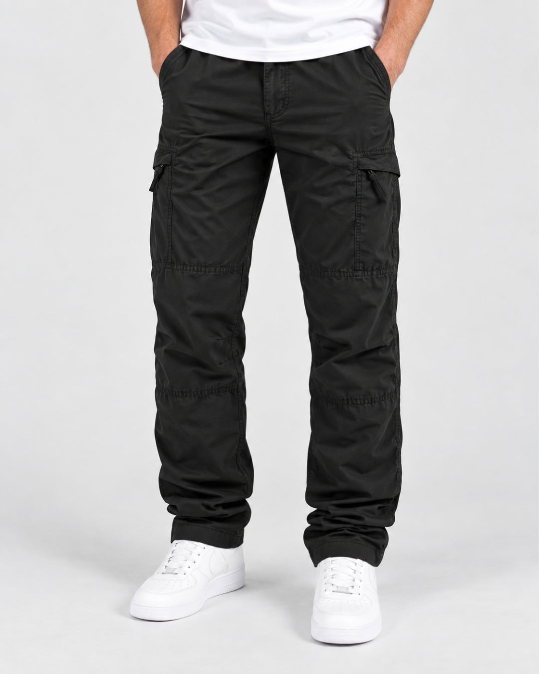 Men wearing black fleece-lined cargo pants with side pockets, knee seam detailing, and a relaxed straight-leg fit.