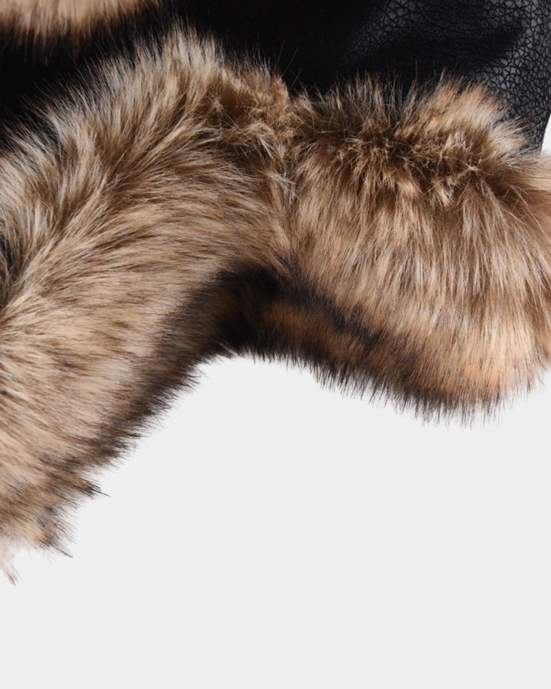 Men’s aviator trapper hat featuring a black textured outer shell and thick, brown plush faux fur trim for winter warmth.