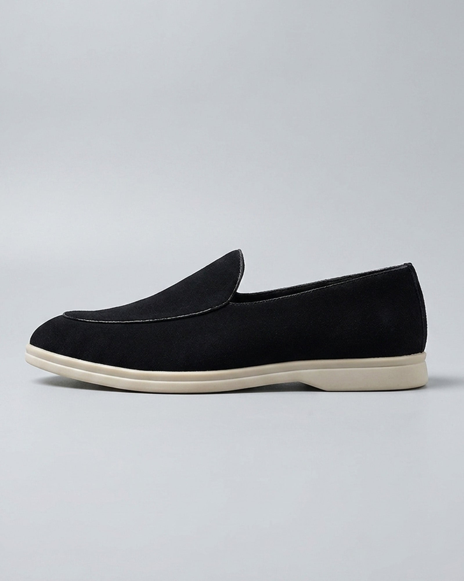 Side view of Milan men's black suede slip-on loafer