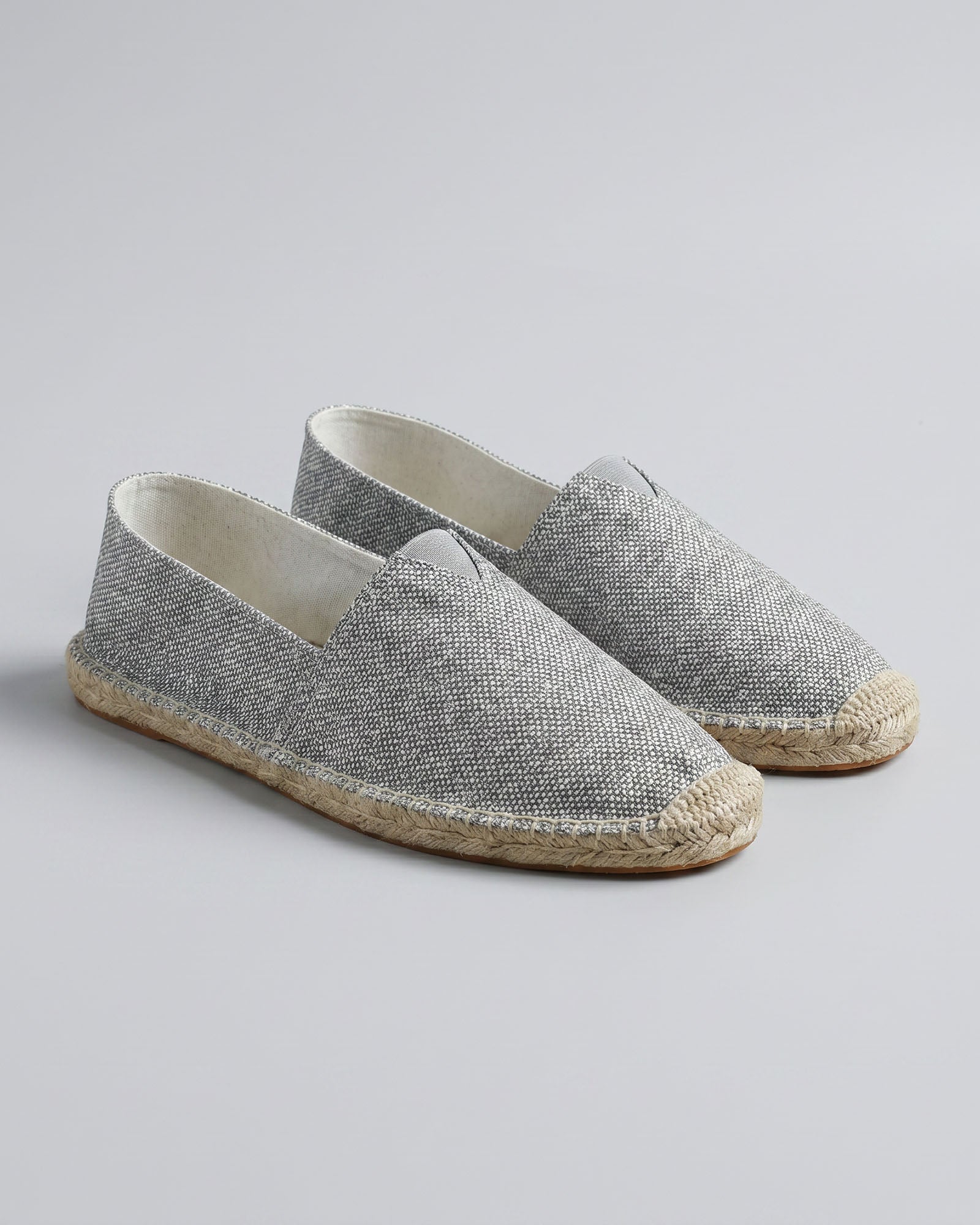 Pair of Tulum men's gray canvas espadrille loafers with woven jute sole