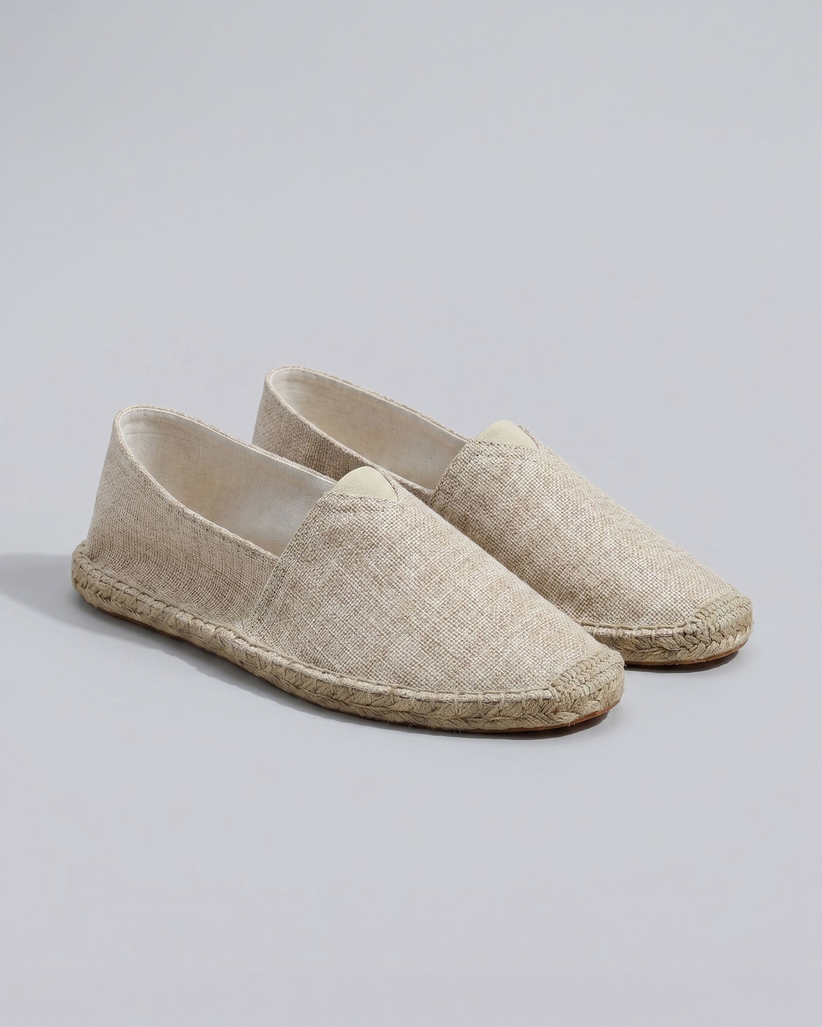 Pair of Tulum men's sand canvas espadrille loafers with woven jute sole