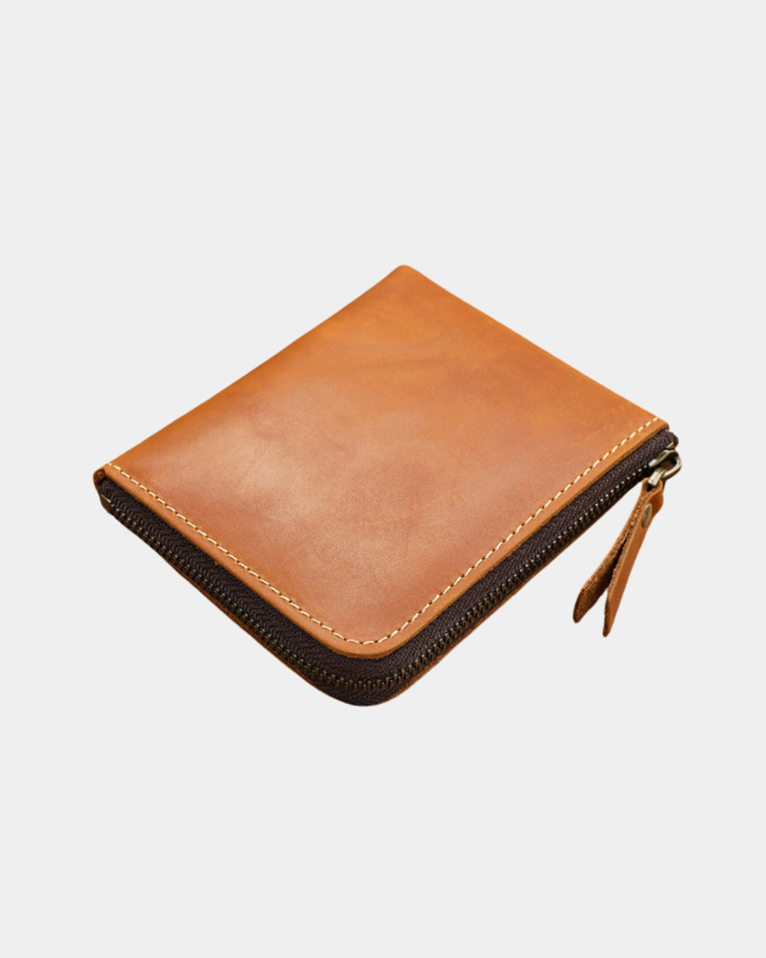 Tan genuine cowhide leather men’s wallet with a secure full zip-around closure and compact, minimalist design.