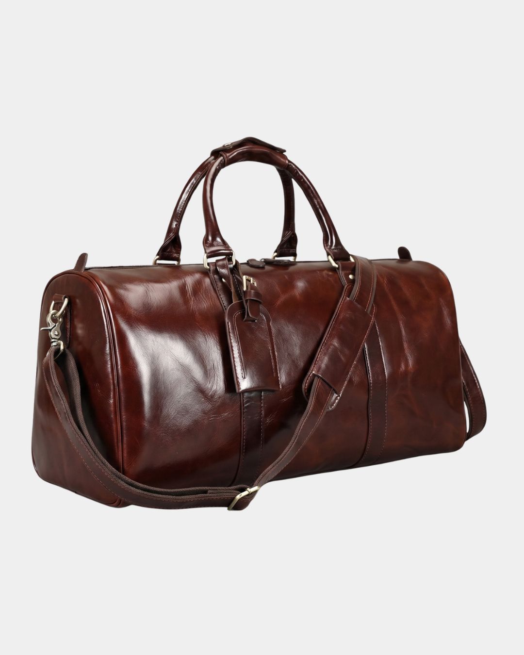 Detail of men's leather weekender duffel bag luggage tag and zip closure