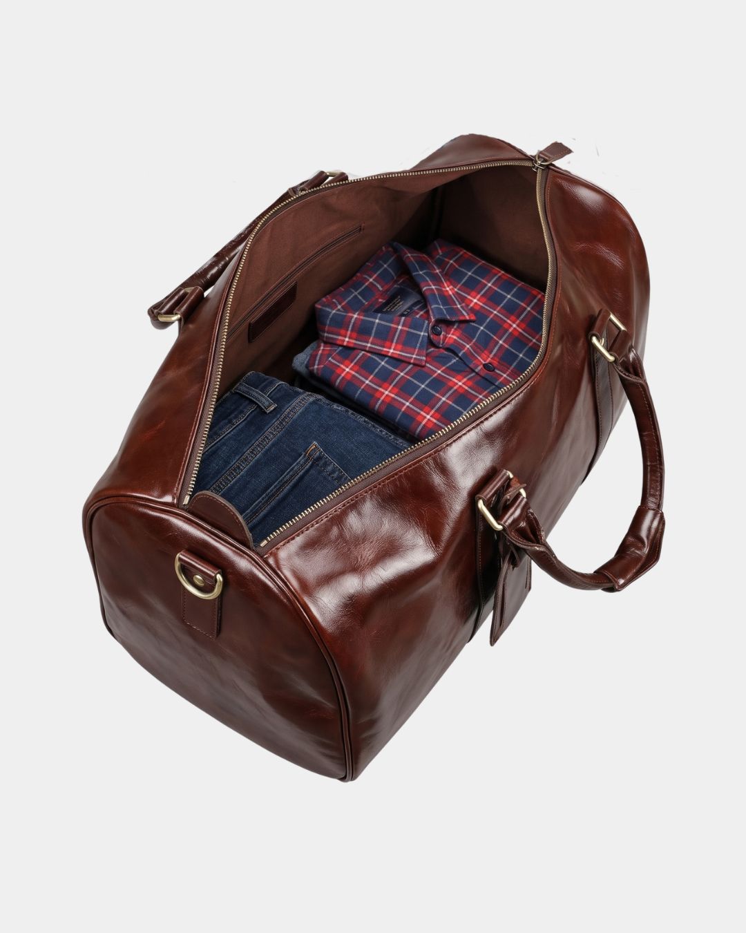 Detail of men's leather weekender duffel bag luggage tag and zip closure