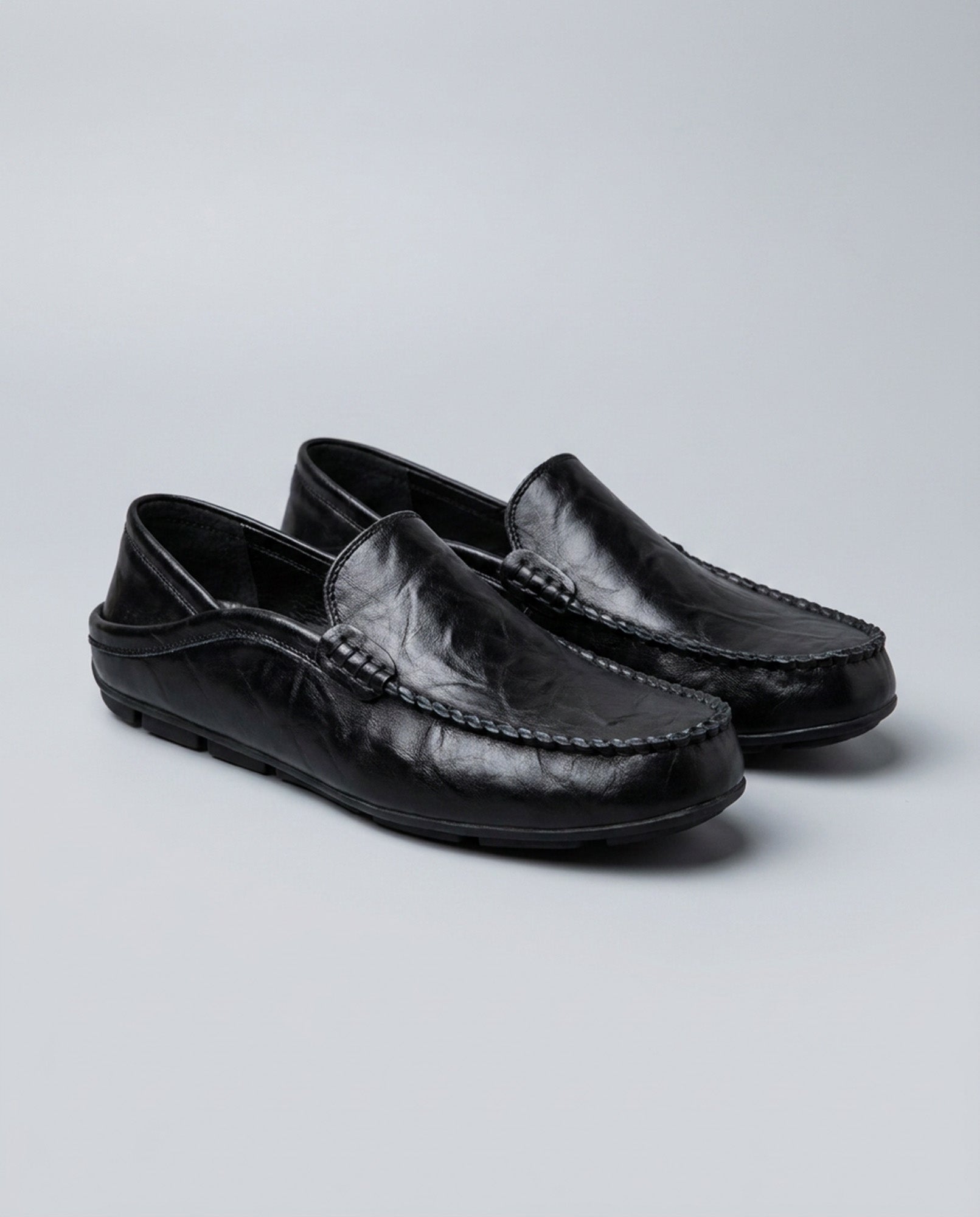 Pair of Beckett men's black leather driving loafers