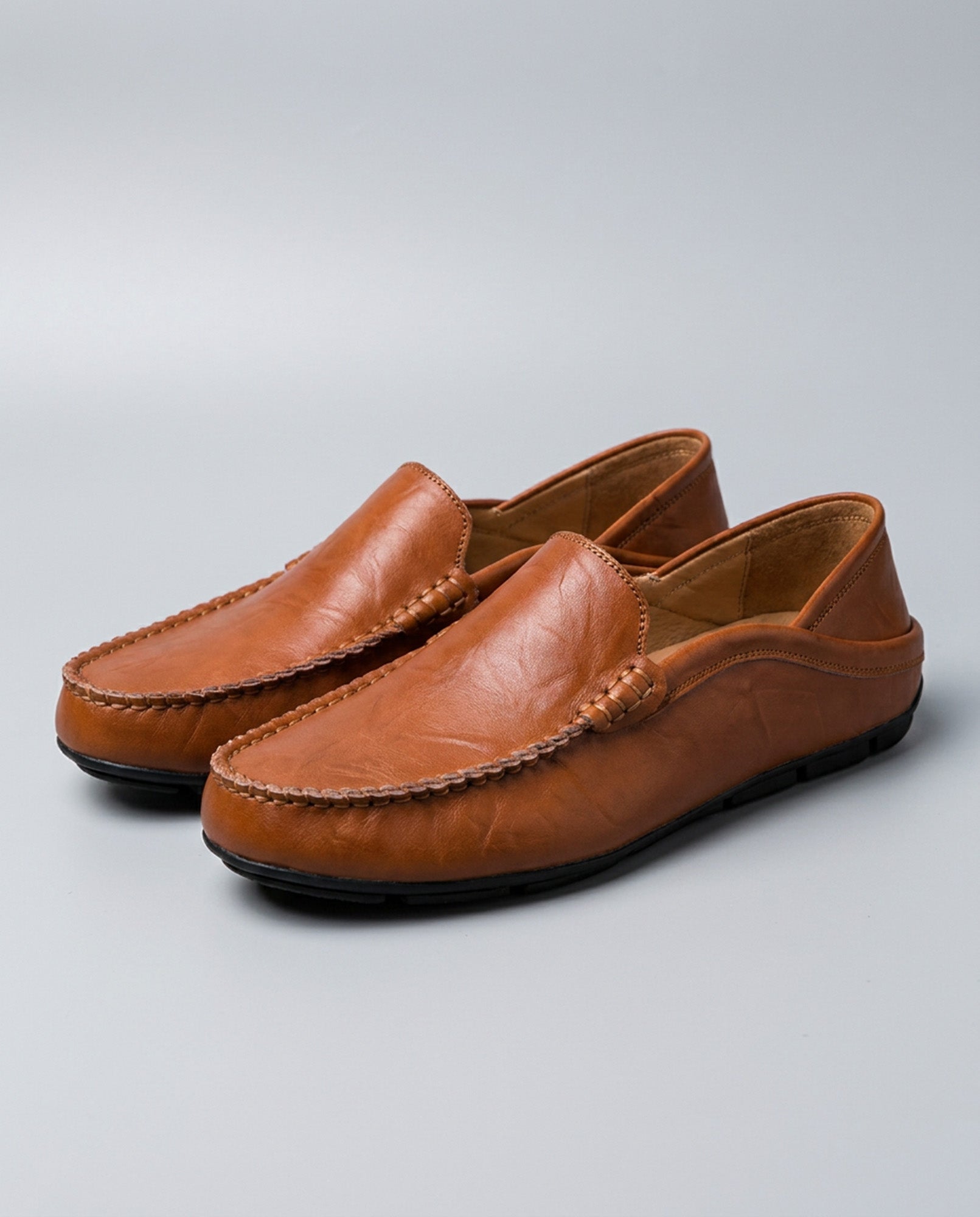 Pair of Beckett men's cognac leather driving loafers