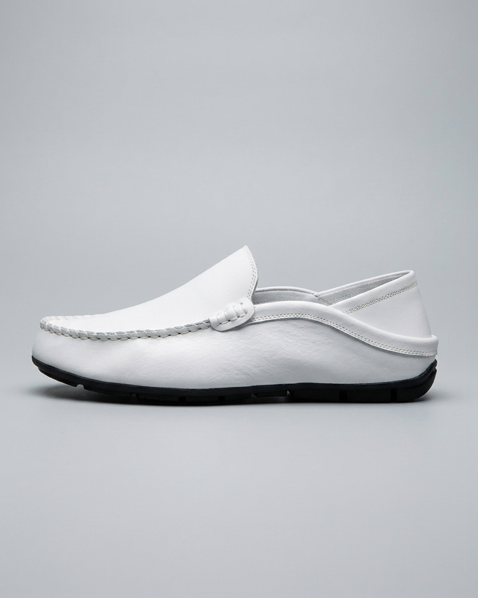 Side view of Beckett men's white leather driving loafer