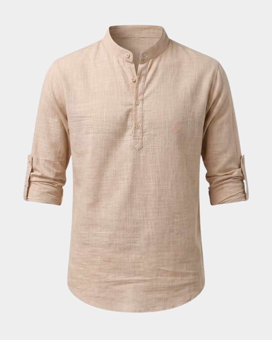 Beige shirt with rolled-up sleeves on a white background